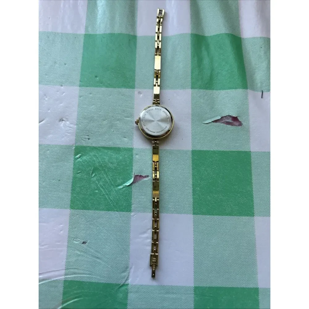 Gold Tone Rhinestone Band Women’s Quartz Watch